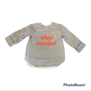 Zara striped top with “shop around” graphic on back